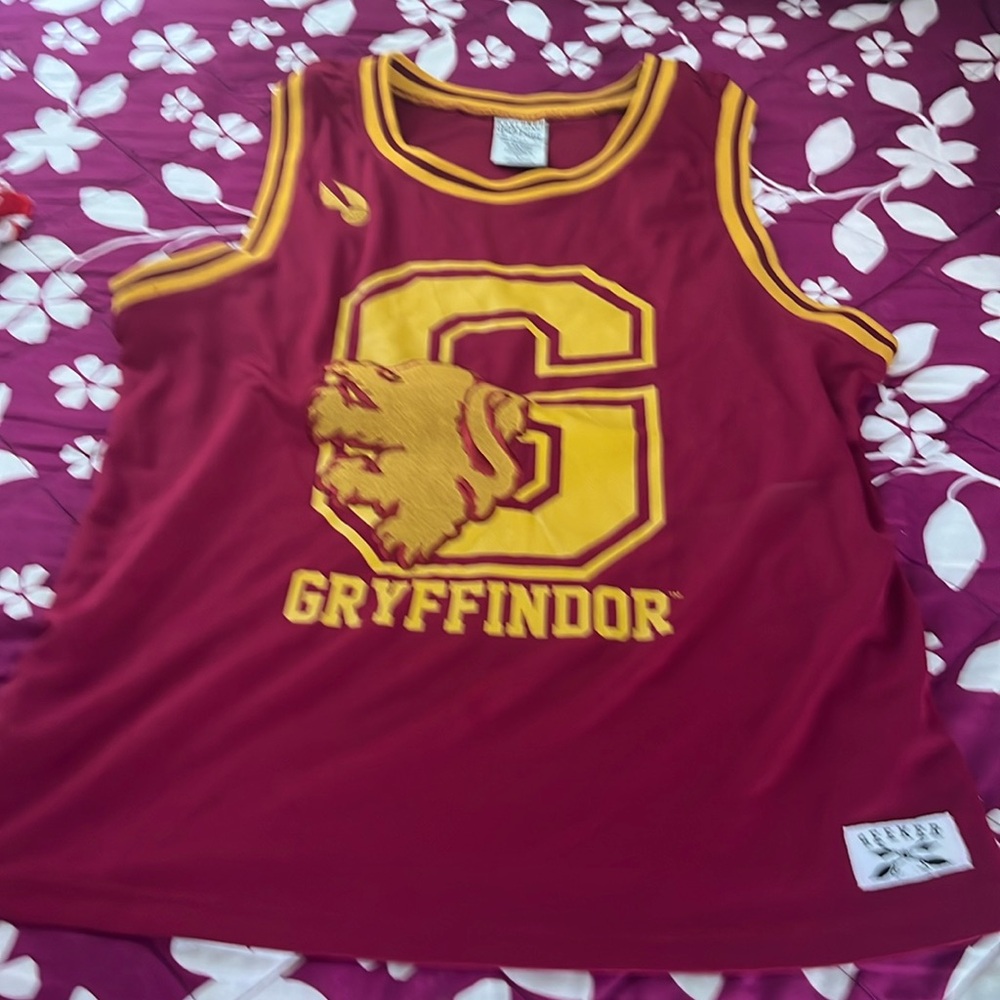 Griffindor basketball style jersey from BoxLunch Large. Since I rarely use it.